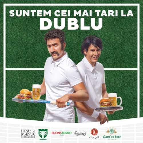 Promo poster showing two men in white shirts carrying burgers and beer on trays, standing back-to-back on a green field background with bold Romanian text 'SUNTEM CEI MAI TARI LA DUBLU' and restaurant logos along the bottom.